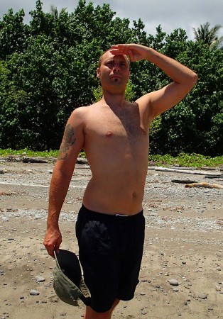 Jim posing on his island in 2013