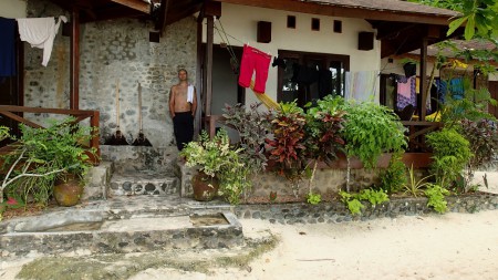 Jim outside his home in Indonesia in 2013